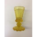 1936 BERLIN CUT GLASS - A yellow cut glass crystal decorative goblet,