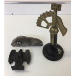 THIRD REICH STATUES - three pieces of Third Reich militaria to include a mounted brass Reichsadler