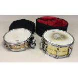PEARL SNARE DRUMS AND CASES. Two Pearl snare drums with matching soft carry cases. To include a 12.
