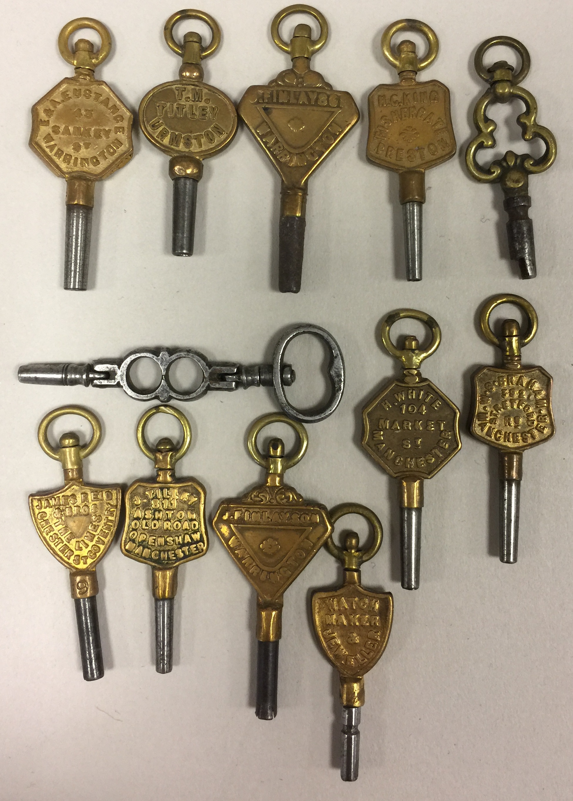 POCKET WATCH KEYS. Twelve assorted watch keys/winders, stamped variously with the name of: J.