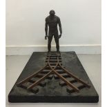 LORENZO QUINN DECISIONS. (1966-) a limited edition bronze sculpture on carved wooden base.