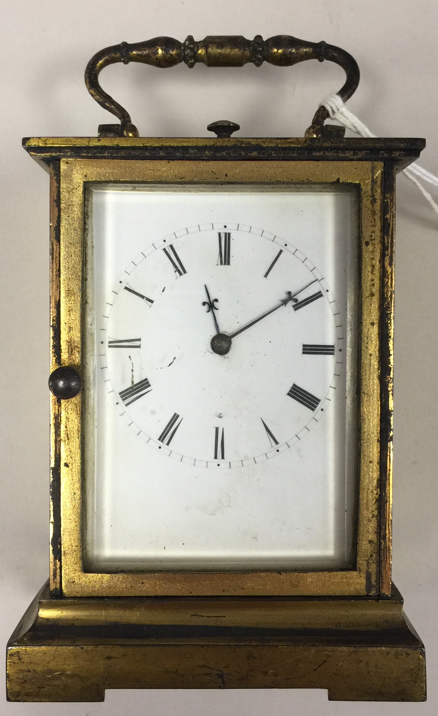 ENGLISH 19TH CENTURY CARRIAGE CLOCK. A gilt English fusee carriage clock repeater, dated to 1880.