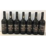 CROFT 1985. Seven bottles of Croft 1985 vintage port.