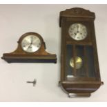 PAIR OF CLOCKS. An art deco style mantle clock with 'Westminster' chimes, marked 'Foreign' to face.