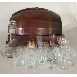 BARREL DRINKS CABINET AND GLASSES.