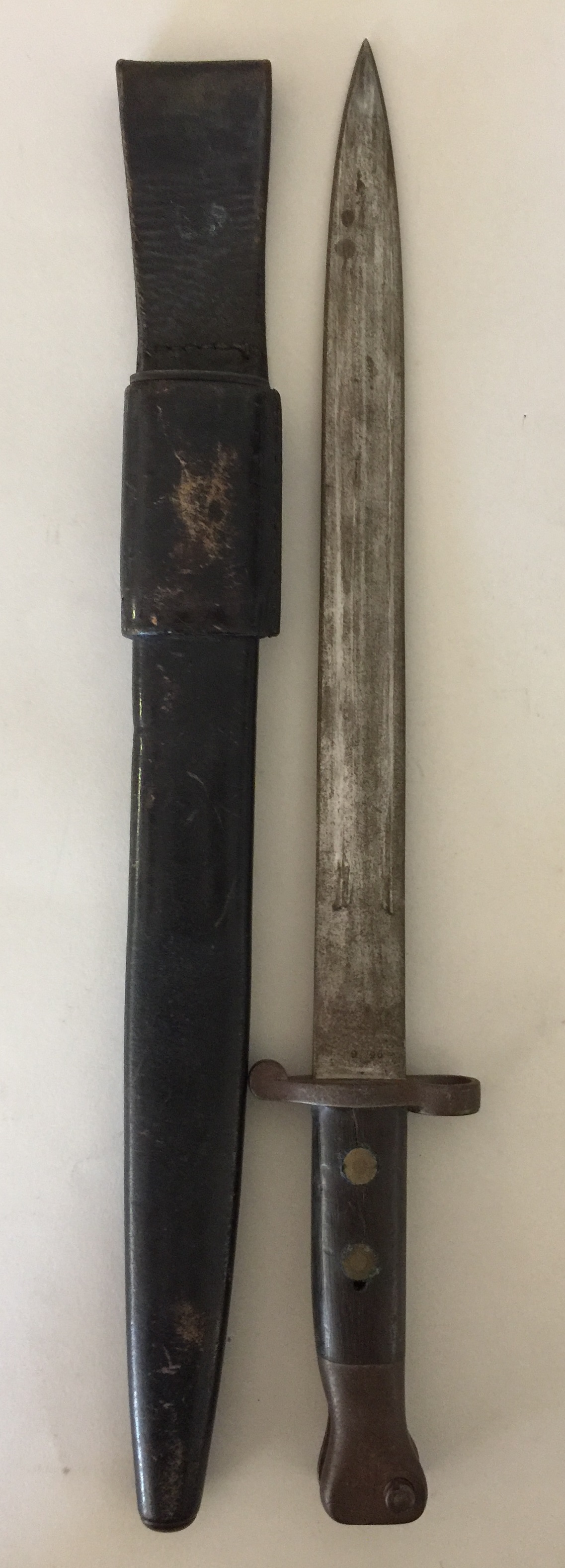 VICTORIAN BAYONET AND SCABBARD. A bayonet and scabbard, likely from Victorian period.