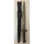 VICTORIAN BAYONET AND SCABBARD. A bayonet and scabbard, likely from Victorian period.