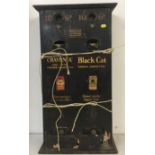 BLACK CAT VENDING MACHINE. A painted wooden Black Cat cigarette dispenser.