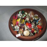 Bowl of costume jewellery