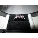 9 ct modern white gold ring set with three amethysts in presentation box