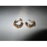 Pair of 9 ct gold earrings 2 g