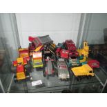 Shelf of vintage die cast toy cars : Lesney Corgi Aston Martin,