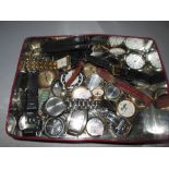 Tin of assorted watches