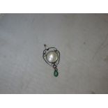 Pretty Art Nouveau pendant with mother of pearl and green hardstone in the style of Charles Horner