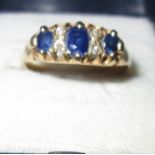 18 ct gold ring set with three saphirres and small diamonds size 58 2 g
