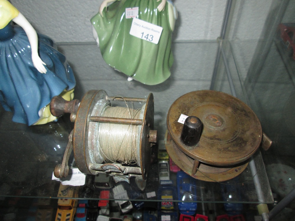 Early 20th century Hardy brass fishing reel 10 cms diameter,