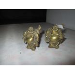 Pair of brass Ho Tei Buddha figures