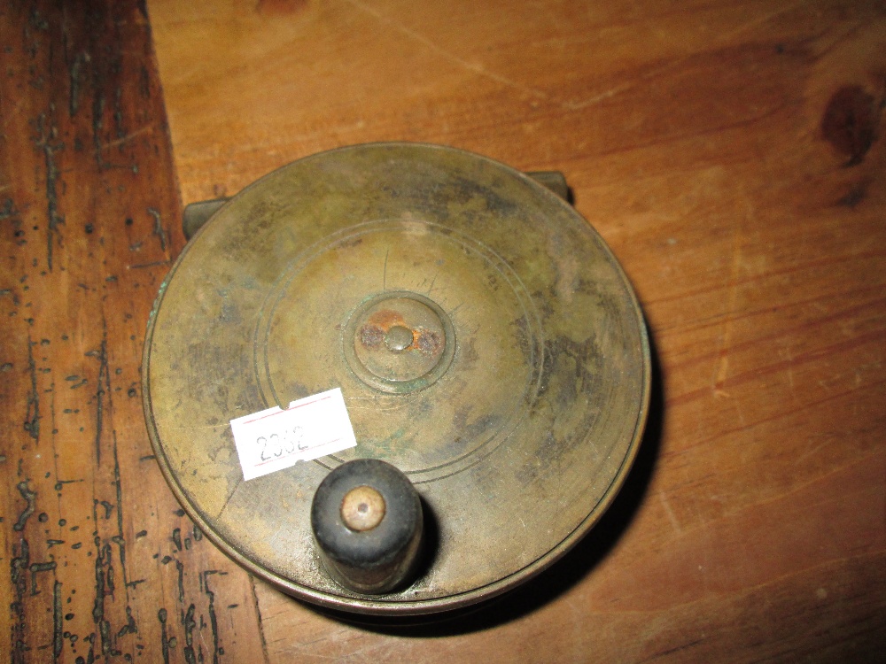 Early 20th century Hardy brass fishing reel 10 cms diameter, - Image 2 of 5