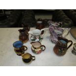 Assorted Victorian and later jugs including lustre ware