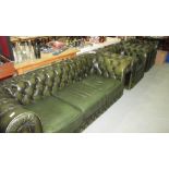 Vintage green leather chesterfield suite comprising of two armchairs and three seater settee