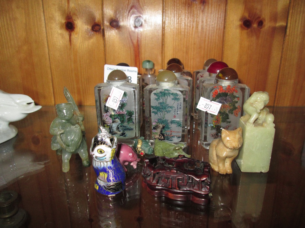 Small collection of 20th century Chinese snuff bottles, carved jade and hardstone figures,