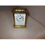 Early 20th century brass case carriage clock lion back stamp on reverse