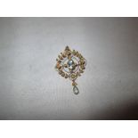 Pretty unmarked 9 ct gold drop pendant / brooch set with seed pearls with two aquamarines