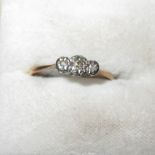 18 ct gold ring set with three small diamonds size 50 2 g