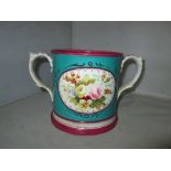 19th century Staffordshire pottery loving cup with floral decoration