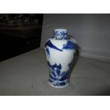 Antique Chinese blue and white baluster vase with four character mark underneath