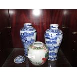 Pair of Chinese baluster shape blue and white export pottery vases decorated with men on bridge