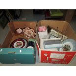 2 x boxes of decorative china, plates bowl, games etc.