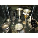 Shelf of plated ware