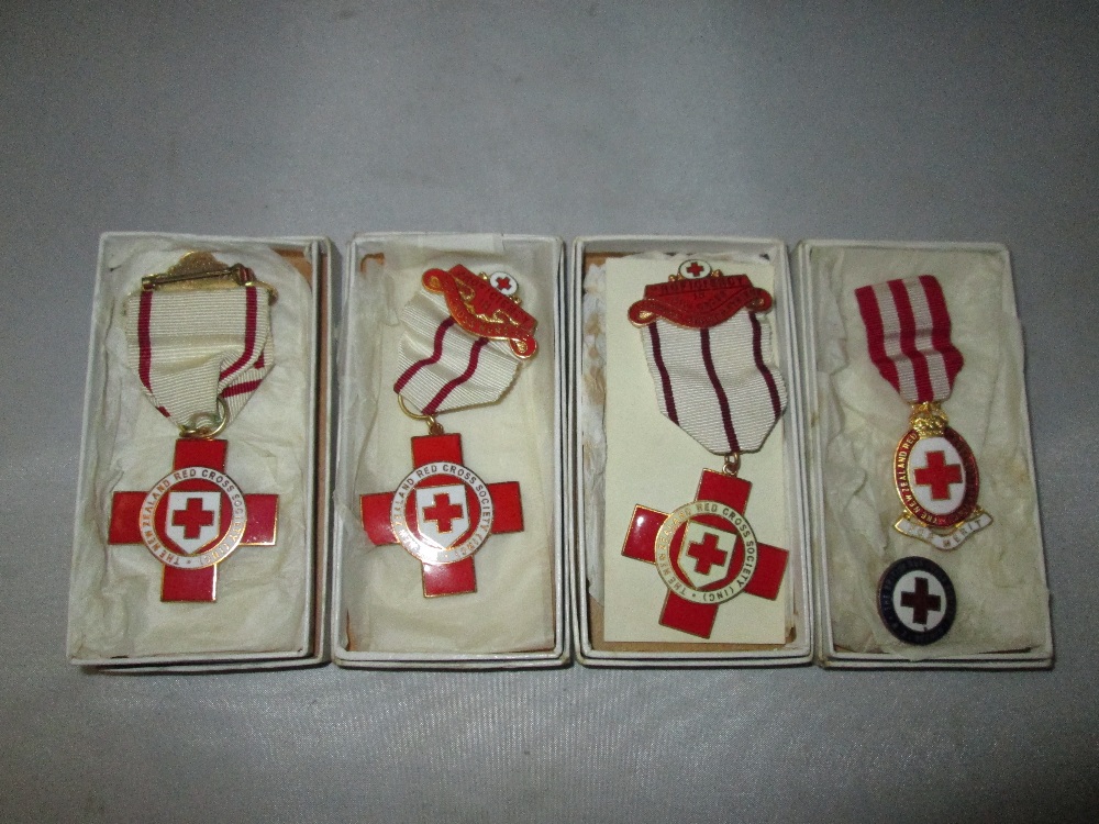 4 x Red Cross enamel medals in boxes of issue