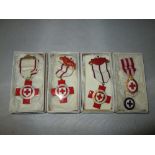 4 x Red Cross enamel medals in boxes of issue