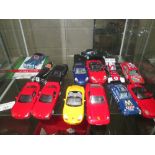 Shelf of collectors die cast toy cars : Atlas Editions Jaguar with certificate, Burago,