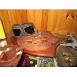 RAF copper ashtrays, carved wooden insignia, flight goggles,