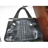 Crocodile skin handbag