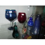 Assorted coloured glassware and paperweights