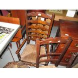 Edwardian inlaid mahogany pedestal, rush seated ladderback chair, carved occasional table,