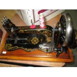 Antique Singer hand crank fiddle base sewing machine in wooden case