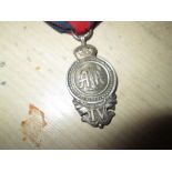 Silver Army Temperance Association medal with ribbon