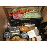 Assorted Guiness memorabilia : drip trays, ashtray, bottles of beer,