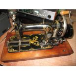 Late 19th century hand crank sewing machine