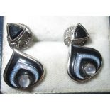Pair of modern silver and enamel earring
