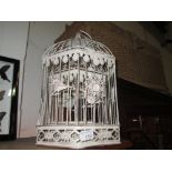 Set of three graduated bird cages