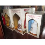 4 x Bells whisky advertising bottles (boxed & sealed)