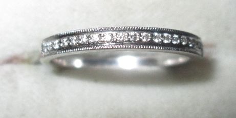 18 ct white gold and diamond semi eternity ring size 55, 3.