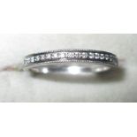 18 ct white gold and diamond semi eternity ring size 55, 3.