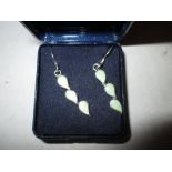 Pair of modern silver and green enamel earring in presentation box